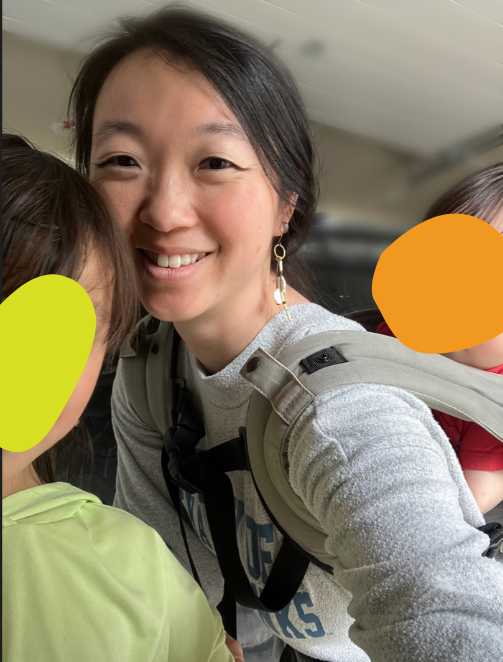 Alice Rhee smiling with her two children